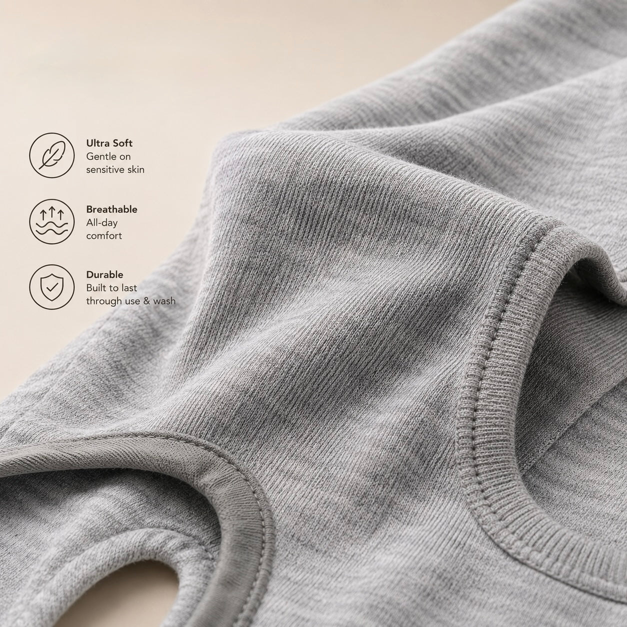 Close-up of the soft, breathable ribbed knit fabric of the Hygge dog recovery suit