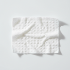 Textured single dog wipe, thick and moist, made from soft plant-based material